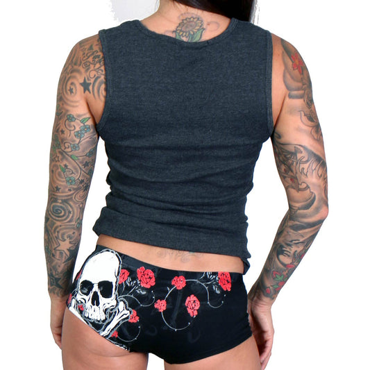 This image showcases the Hot Leathers PTB7007 Red Roses Boy Shorts, designed for a comfortable and stylish fit. The shorts are black and feature a striking screen-printed design on the front, depicting a skull and crossbones with vibrant red roses flowing across, adding a bold graphic print to the apparel.