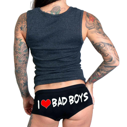This image features a pair of women's boy shorts, designed with a bold and playful message. The shorts are black with the phrase "I ♥ BAD BOYS" printed in white, making it a striking visual statement.