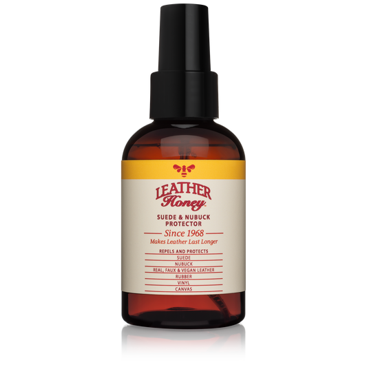 Bottle of Leather Honey suede and nubuck protector on a white background