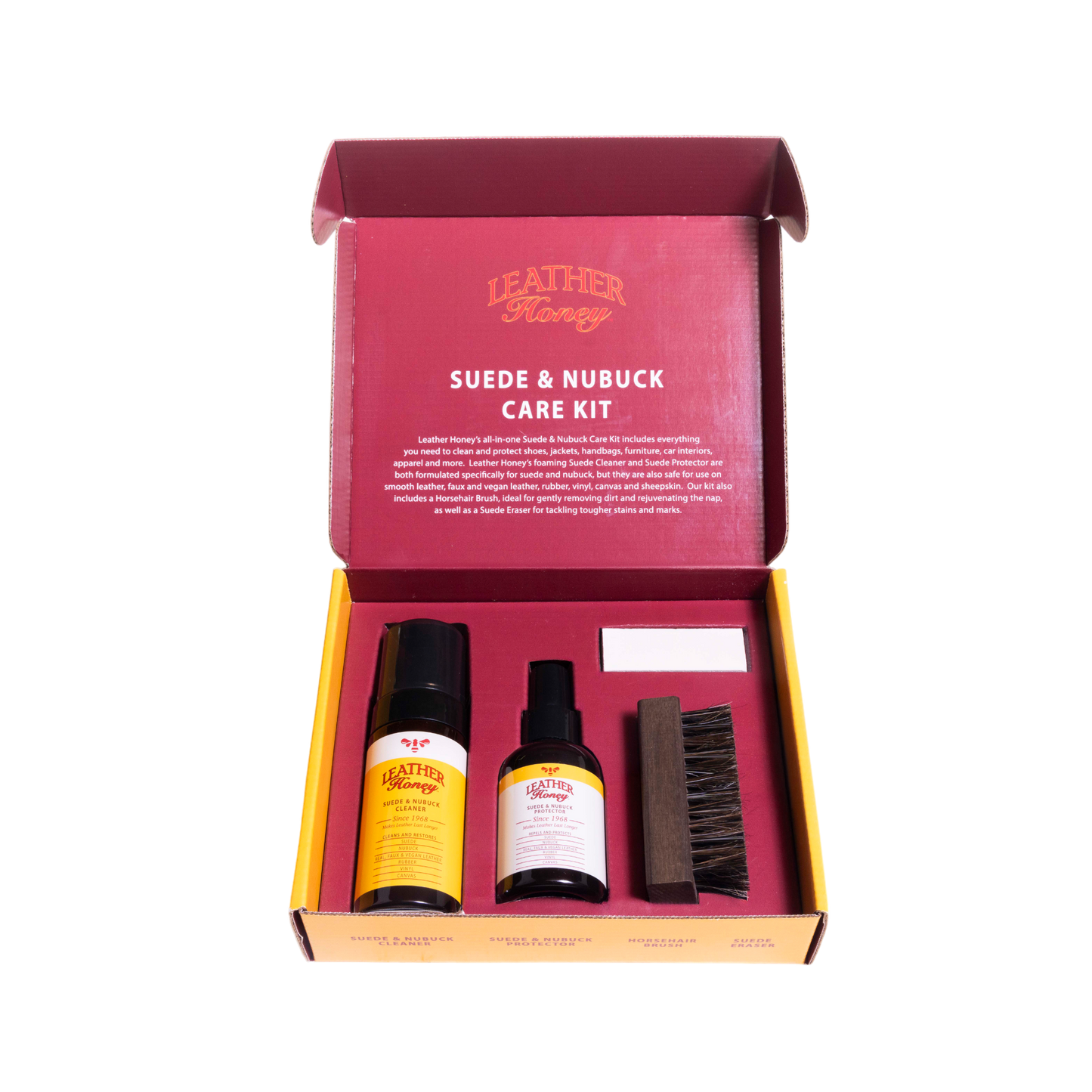Suede and nubuck care kit with bottles and a brush in a red box on a white background