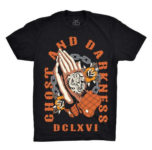 Black t-shirt with graphic design traditional tattoo style of hands and text on a white background