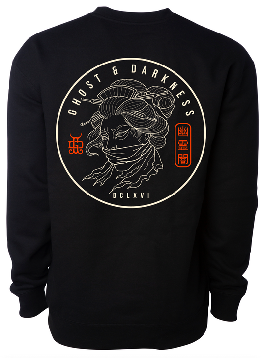 Black sweatshirt with a circular tattoo art design featuring a face and text on the back