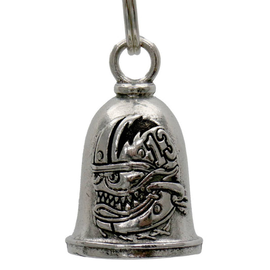 A silver motorcycle good luck bell with a key ring, featuring a decorative monster design.