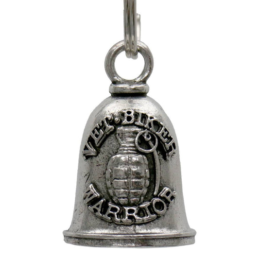 A silver-colored metal bell with a key ring, featuring embossed text and designs.