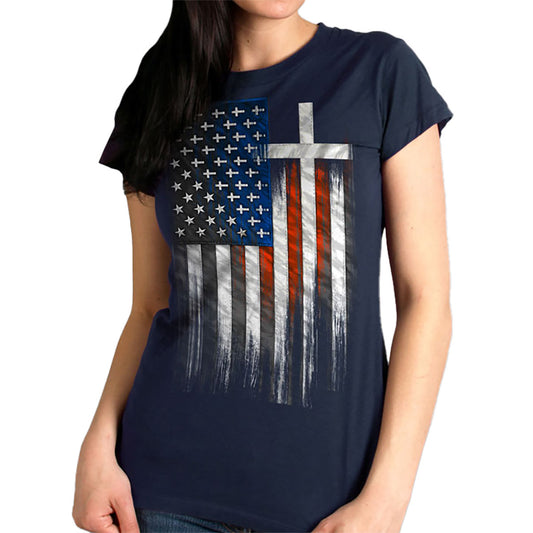A woman wearing a black short-sleeved t-shirt with a graphic print of the American flag and a cross on the front.