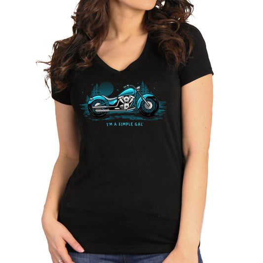 A woman wearing a black short sleeve t-shirt with a graphic print of a motorcycle and the phrase 'I'm a simple gal' on the front.