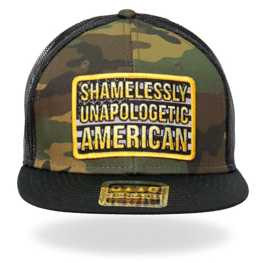 A camouflage snapback hat with a flat brim and an adjustable plastic tab, featuring a patch with the text 'SHAMELESSLY UNAPOLOGETIC AMERICAN' on the front.