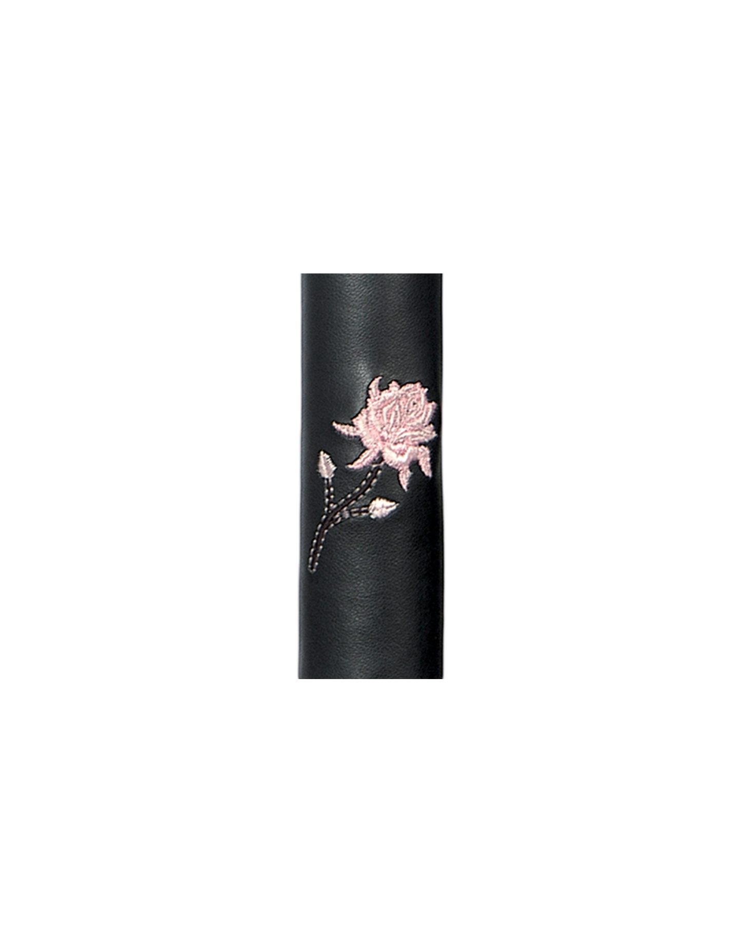 Black leather cylindrical hair tube product with a pink floral design on a white background