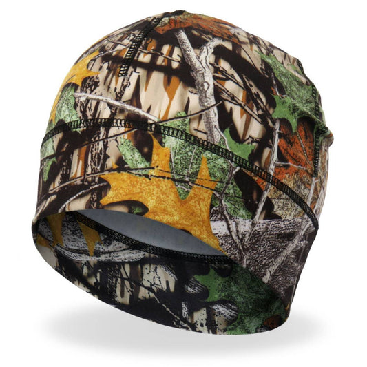 A camouflage helmet liner with a bright sublimated design, featuring a mix of green, brown, and black colors.