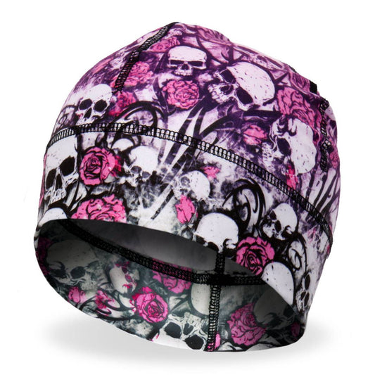 A beanie helmet liner with a graphic print of skulls and pink flowers on a white background, designed for motorcycle apparel.