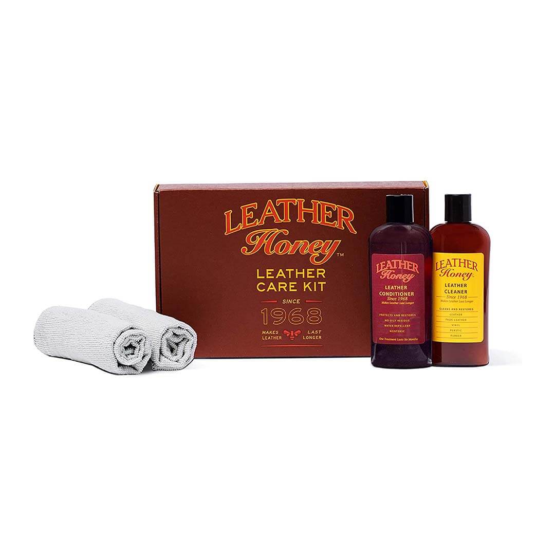 Leather Honey leather care kit with two bottles, a cloth, and a box on a white background