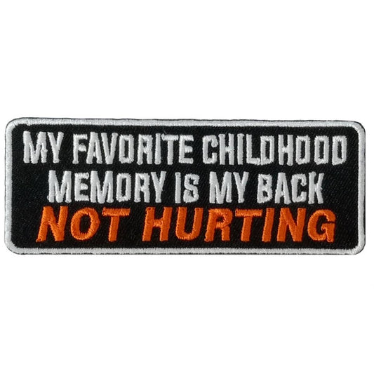 A rectangular black, white, and orange embroidered patch with the text 'MY FAVORITE CHILDHOOD MEMORY IS MY BACK NOT HURTING'.