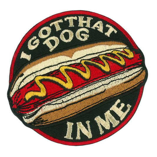 Embroidered patch with a hot dog and the phrase 'I GOT THAT DOG IN ME' on a circular background.