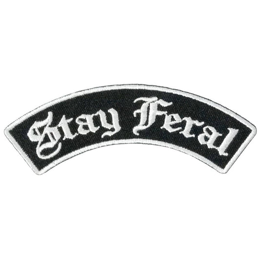 A curved black and white embroidered patch with the text 'Stay Feral'.